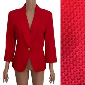 Bob Mackie orange textured blazer.